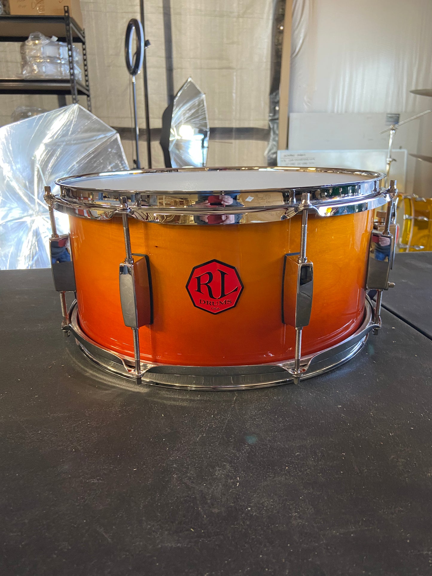 Orange bust birch snare drum